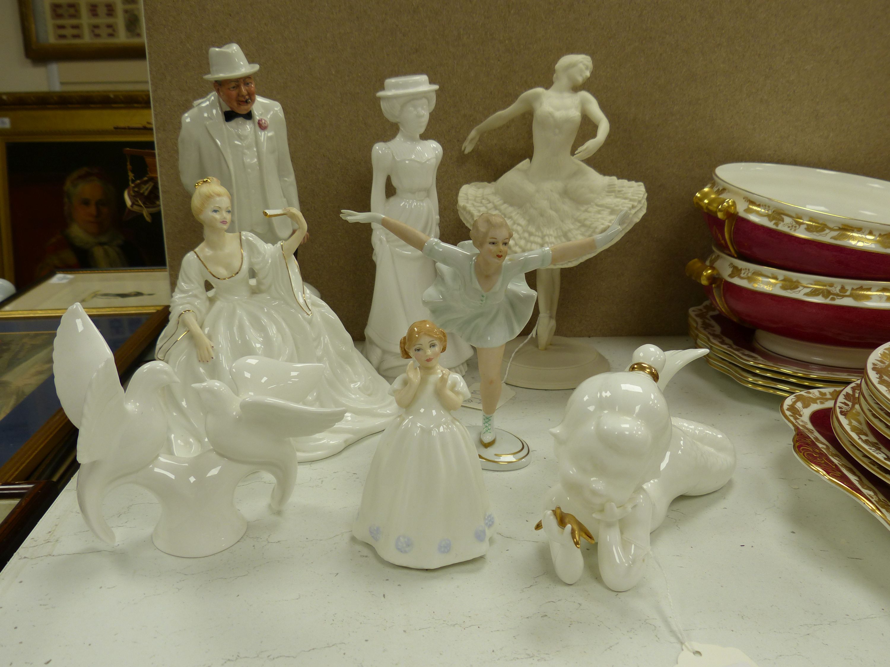 Eight ceramic figures, including a Royal Doulton 'Sir Winston Churchill', Copeland, Spode, 'Anna Pavlova', etc